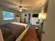 Comfortable bedroom with a large bed, ample natural light, and modern decor at 120 Borada Rd, Sanford, FL 32773
