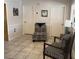 Hallway sitting area featuring tile floors and two armchairs at 120 Borada Rd, Sanford, FL 32773