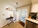 Well-equipped kitchen space featuring modern appliances and a convenient walk-out at 121 Bougainvillea Dr, Leesburg, FL 34748