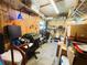 Well-lit storage room offering versatile shelving and workspace solutions, perfect for organization at 121 Bougainvillea Dr, Leesburg, FL 34748