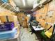Spacious storage room featuring ample shelving and organization, ideal for a workshop or hobbies at 121 Bougainvillea Dr, Leesburg, FL 34748