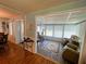Relaxing sunroom with ample seating, lots of windows, and great natural light at 121 Bougainvillea Dr, Leesburg, FL 34748
