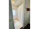 Bathroom featuring tile floors, toilet, and shower/tub combo with curtain at 139 Royal Palm Dr, Leesburg, FL 34748