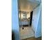 Functional bathroom with a vanity featuring a sink and a mirrored cabinet at 141 Aspen Cir, Leesburg, FL 34748