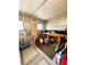 Organized storage room with a workbench, tools, and ample space for storage and hobbies at 141 Aspen Cir, Leesburg, FL 34748
