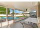 Enclosed lanai with view of the pool, great for outdoor entertaining and relaxing at 144 Pinewood Cir, Kissimmee, FL 34743