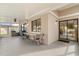 Outdoor patio with table and chairs, ideal for gatherings and relaxing at 144 Pinewood Cir, Kissimmee, FL 34743