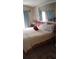 Cozy bedroom featuring a comfortable bed, soft lighting, and ample storage space at 1484 Avleigh Se Cir, Orlando, FL 32824