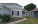 Charming single-story home featuring well-maintained landscaping and a welcoming entrance at 1484 Avleigh Se Cir, Orlando, FL 32824