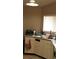 Kitchen area featuring white cabinets, a sink, and essential appliances for cooking at 1484 Avleigh Se Cir, Orlando, FL 32824