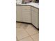 Close-up of kitchen cabinets in need of repair at 1484 Avleigh Se Cir, Orlando, FL 32824