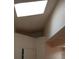 A room featuring a skylight offering natural light at 1484 Avleigh Se Cir, Orlando, FL 32824