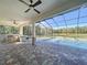 Enjoy the outdoor kitchen and beautiful in ground pool in the screened lanai! at 15373 Evans Ranch Rd, Lakeland, FL 33809