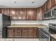 Gourmet kitchen showcasing granite counters, stainless appliances, and plentiful storage at 1936 Bell Creek Loop, Fruitland Park, FL 34731