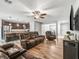 Open floor plan showcasing the living room flowing into the kitchen and dining area at 1936 Bell Creek Loop, Fruitland Park, FL 34731