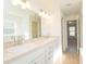 Bathroom with double vanity and large mirror at 2173 Lincoln Ln, Bartow, FL 33830
