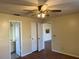 A sunlit bedroom with hardwood floors and a ceiling fan provides a serene and comfortable retreat at 2408 Fabry Cir, Orlando, FL 32817
