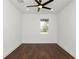 This bright bedroom features a ceiling fan, recessed lighting and a window at 2561 Rogers Rd, Lakeland, FL 33812