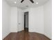This bedroom features wood floors and neutral paint at 2561 Rogers Rd, Lakeland, FL 33812