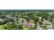 Overhead shot of the residence and its placement within a verdant, well-established residential area at 34 Misty Meadow Ln, Mulberry, FL 33860