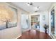 An open foyer with tiled floors and view into living and dining areas at 34 Misty Meadow Ln, Mulberry, FL 33860