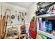 A storage room with power tools, a ladder, paint, and a stool at 34 Misty Meadow Ln, Mulberry, FL 33860