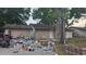 Modest single-story home with a lawn and a garage at 4202 Sunny View Dr, Lakeland, FL 33813