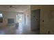 Bright living room with a fireplace, tile flooring and neutral walls at 4202 Sunny View Dr, Lakeland, FL 33813