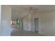 Spacious living room featuring tile flooring and a ceiling fan at 4202 Sunny View Dr, Lakeland, FL 33813