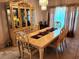 Stunning dining room featuring large windows and classic furnishings, perfect for entertaining at 4613 Eaglet Ln, Kissimmee, FL 34746