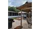 Relaxing backyard with a hammock and outdoor seating area, perfect for enjoying the outdoors at 4814 Myrtle View N Dr, Mulberry, FL 33860