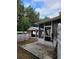 Backyard featuring a screened-in porch, shed, and above ground pool at 4814 Myrtle View N Dr, Mulberry, FL 33860