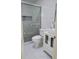 Clean bathroom with glass shower, white sink vanity, and modern fixtures at 4814 Myrtle View N Dr, Mulberry, FL 33860