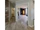 Hallway leading to a naturally lit, stylishly decorated room at 4814 Myrtle View N Dr, Mulberry, FL 33860