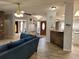 Bright living room with tile floors and a cozy entry area at 4814 Myrtle View N Dr, Mulberry, FL 33860