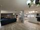 Open living space with a modern kitchen and comfortable seating at 4814 Myrtle View N Dr, Mulberry, FL 33860