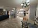 Open living space featuring a modern kitchen and dining area at 4814 Myrtle View N Dr, Mulberry, FL 33860