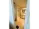 Bathroom features a peach vanity, sink, and shower and bath combination at 511 Hawthorne Blvd, Leesburg, FL 34748