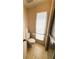 Clean bathroom featuring a shower, toilet, and bright window light at 511 Hawthorne Blvd, Leesburg, FL 34748