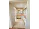 Bathroom area with dual sinks, tiled flooring, mirror, and shower stall at 511 Hawthorne Blvd, Leesburg, FL 34748