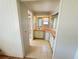 Bathroom area with dual sinks, mirror, tiled flooring, and shower stall at 511 Hawthorne Blvd, Leesburg, FL 34748