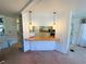 Cozy kitchen bar enhances the open-concept design at 511 Hawthorne Blvd, Leesburg, FL 34748