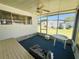 Comfortable screened-in patio perfect for enjoying the outdoors at 511 Hawthorne Blvd, Leesburg, FL 34748