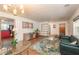Inviting living room features a plush sofa, stylish rug, and ample natural light and open floor plan at 727 Se 12Th St, Ocala, FL 34471