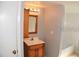 Bathroom featuring a vanity with a sink and light fixture at 1000 S Semoran Blvd # 408, Winter Park, FL 32792