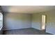 Spacious living room with neutral tones and great natural light at 1000 S Semoran Blvd # 408, Winter Park, FL 32792