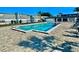 Community pool features a refreshing swimming area and brick paved surrounding on a sunny day at 1000 S Semoran Blvd # 408, Winter Park, FL 32792