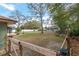 Expansive fenced backyard, with mature trees, a shed, patio and lush landscaping at 10441 Sw 54Th Ct, Ocala, FL 34476