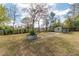 Large backyard with a shed and mature trees at 10441 Sw 54Th Ct, Ocala, FL 34476