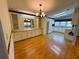Open concept kitchen with bright lighting and dining area at 106 Pyracantha Ln, Leesburg, FL 34748